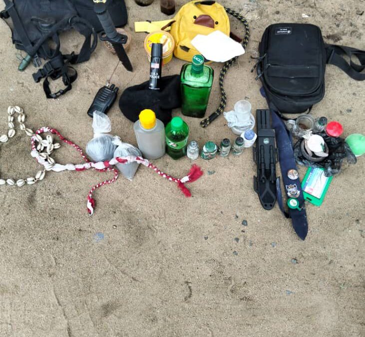 Police In Akwa Ibom Arrest Two Suspected Cultists, Recover Weapons, Cult Paraphernalia