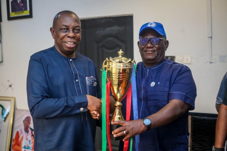 Ukana Tennis Club Presents Trophy To Sports Commissioner, Elder Bassey