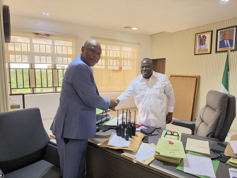 Akpabiosm DG Presents Walkie-Talkies to UNIUYO to Boost Campus Security